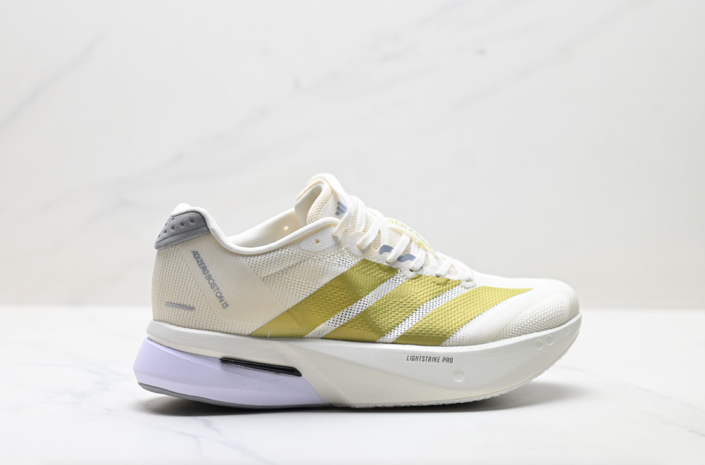 Adizero Boston 13 gold running